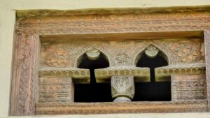 wood carving at traditional village himachal